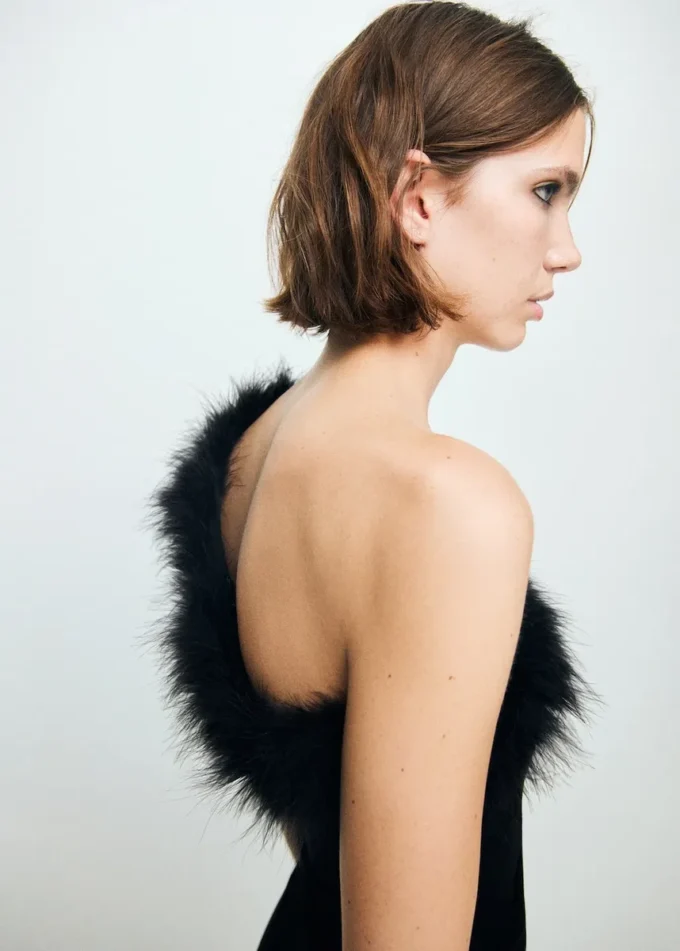 Bluzka z delikatnej dzianiny z piórami Bluzka z delikatnej dzianiny z piórami