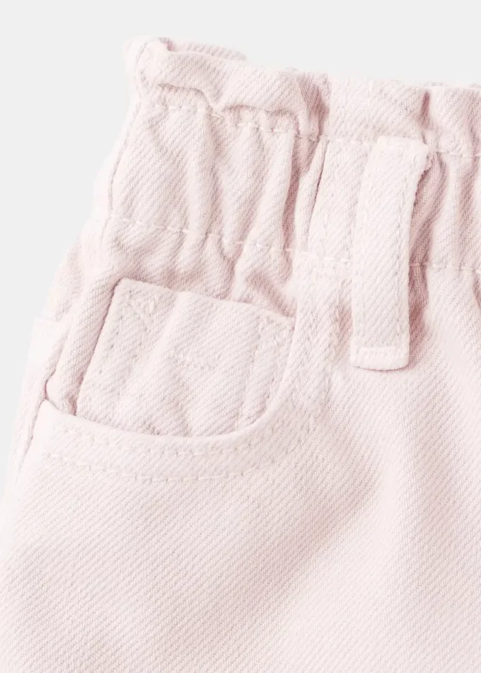 Dżinsy z papierową torbą i guzikami Dżinsy z papierową torbą i guzikami