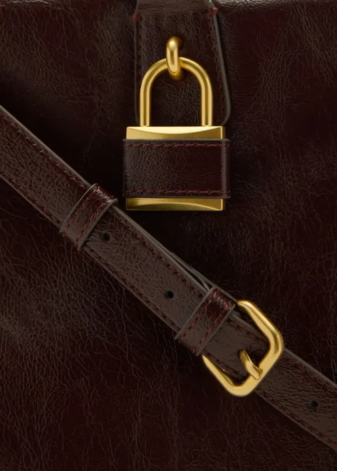 Duża błyszcząca torebka z paskami Duża błyszcząca torebka z paskami