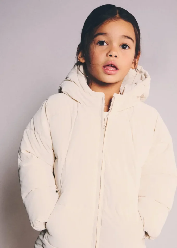 Długa pikowana kurtka z kapturem Długa pikowana kurtka z kapturem