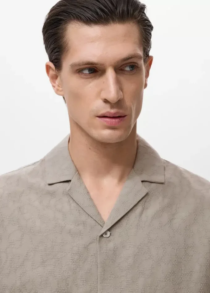 Koszulka w 100% z haftowanej bawełny Koszulka w 100% z haftowanej bawełny