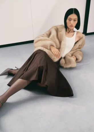 Płaszcz ze sztucznego futra z guzikami Płaszcz ze sztucznego futra z guzikami