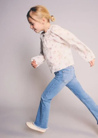 Postrzępione jeansy skinny z niskim stanem