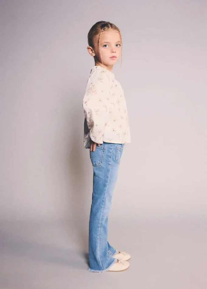 Postrzępione jeansy skinny z niskim stanem