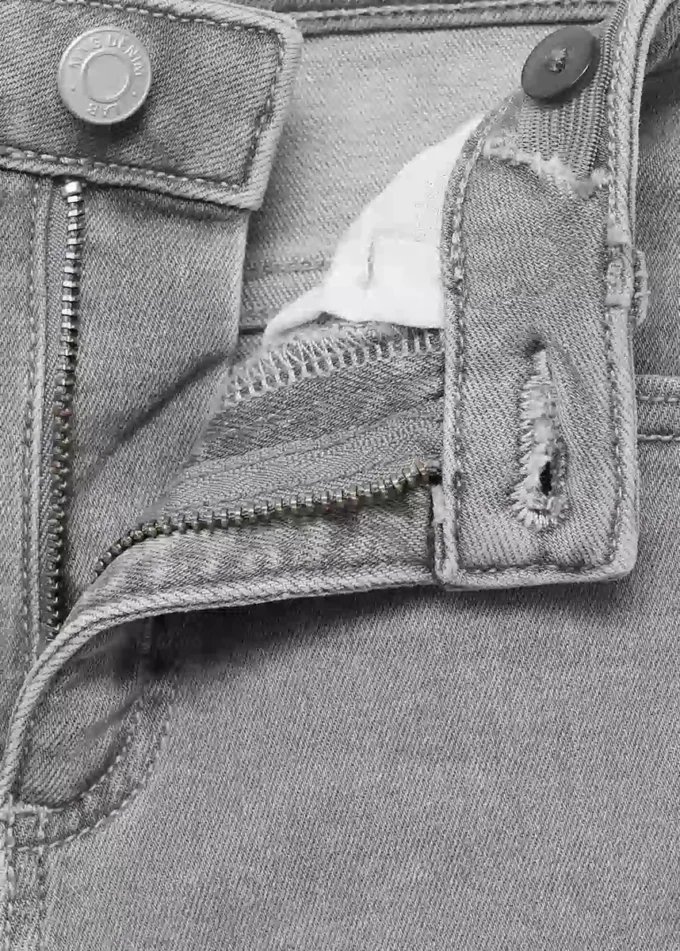 Postrzępione jeansy skinny z niskim stanem