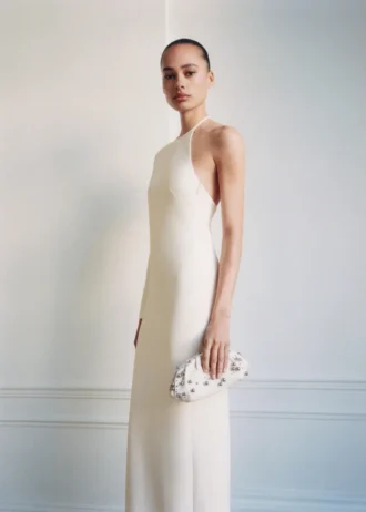 Skórzana torebka z detalami w postaci kulek