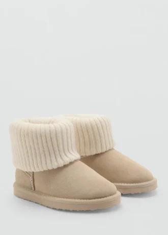 Skórzane botki z dzianinowymi detalami