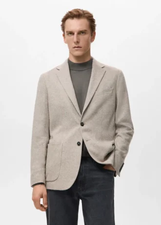 Slim fit marynarka z wełnianej tkaniny w drobne cętki Slim fit marynarka z wełnianej tkaniny w drobne cętki