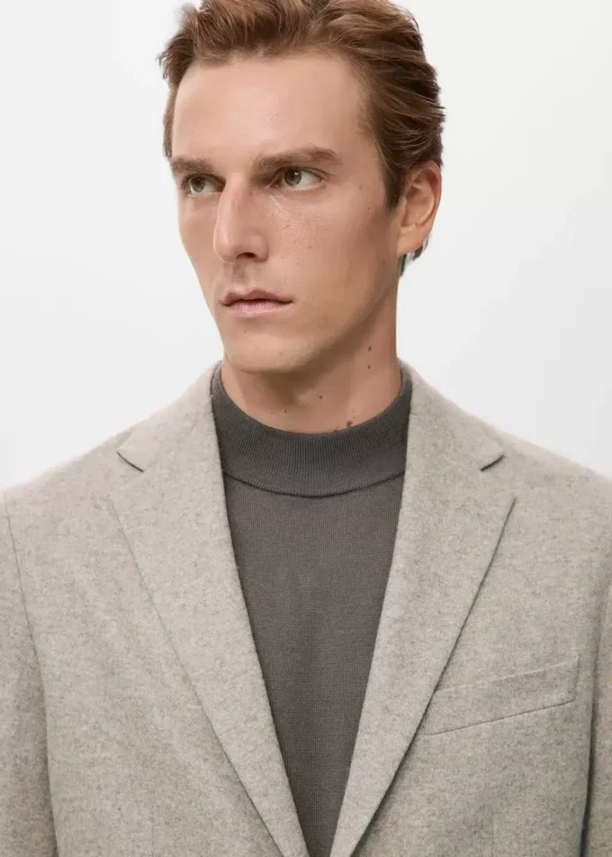 Slim fit marynarka z wełnianej tkaniny w drobne cętki Slim fit marynarka z wełnianej tkaniny w drobne cętki