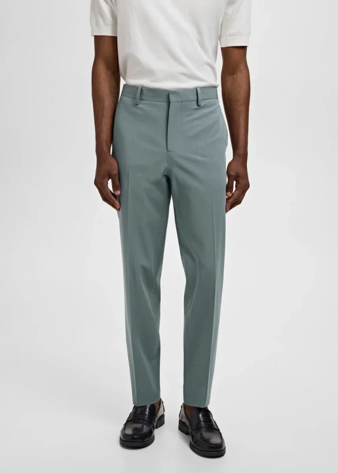 Spodnie garniturowe z elastycznego materiału o bardzo wąskim kroju Spodnie garniturowe z elastycznego materiału o bardzo wąskim kroju