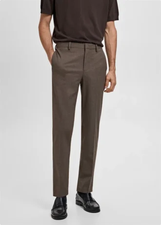 Spodnie garniturowe z elastycznego materiału o bardzo wąskim kroju Spodnie garniturowe z elastycznego materiału o bardzo wąskim kroju