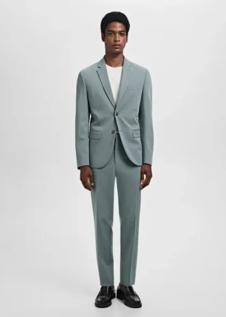 Spodnie garniturowe z elastycznego materiału o bardzo wąskim kroju Spodnie garniturowe z elastycznego materiału o bardzo wąskim kroju