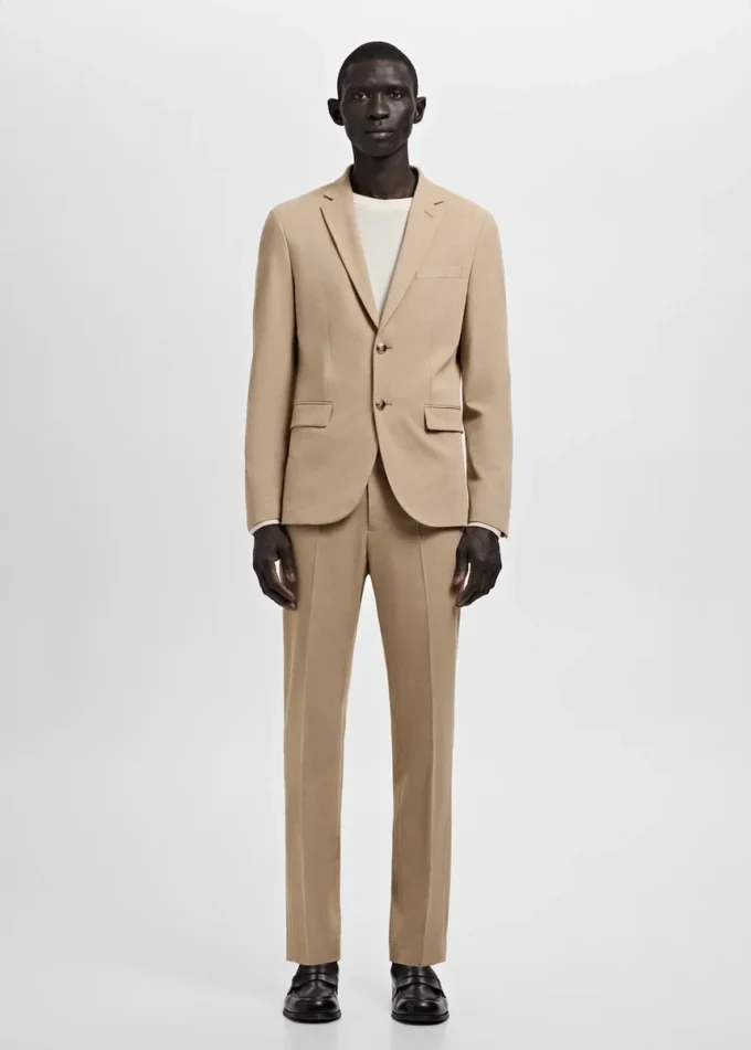 Spodnie garniturowe z elastycznego materiału o bardzo wąskim kroju Spodnie garniturowe z elastycznego materiału o bardzo wąskim kroju