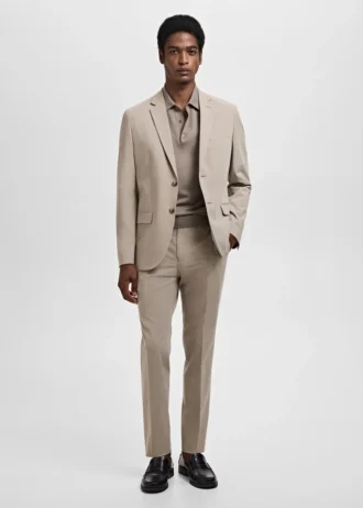 Spodnie garniturowe z elastycznego materiału o bardzo wąskim kroju Spodnie garniturowe z elastycznego materiału o bardzo wąskim kroju