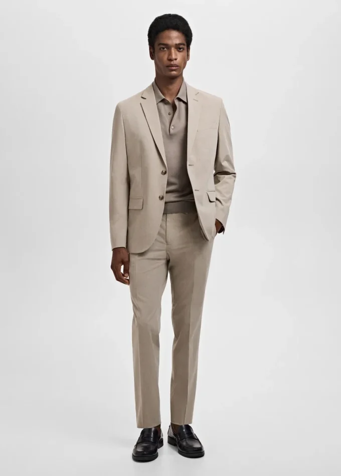 Spodnie garniturowe z elastycznego materiału o bardzo wąskim kroju Spodnie garniturowe z elastycznego materiału o bardzo wąskim kroju