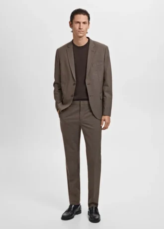 Spodnie garniturowe z elastycznego materiału o bardzo wąskim kroju Spodnie garniturowe z elastycznego materiału o bardzo wąskim kroju