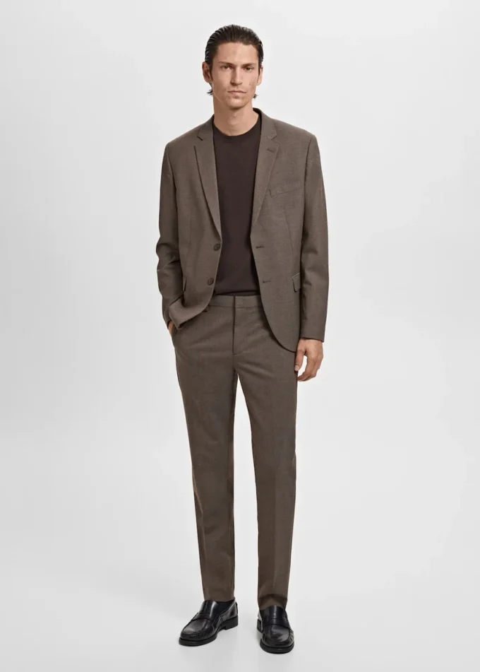 Spodnie garniturowe z elastycznego materiału o bardzo wąskim kroju Spodnie garniturowe z elastycznego materiału o bardzo wąskim kroju