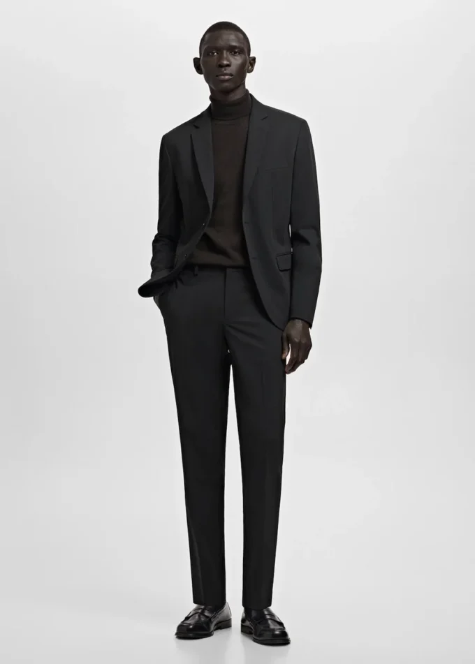 Spodnie garniturowe z elastycznego materiału o bardzo wąskim kroju Spodnie garniturowe z elastycznego materiału o bardzo wąskim kroju