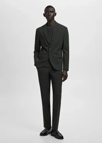 Spodnie garniturowe z elastycznego materiału o bardzo wąskim kroju