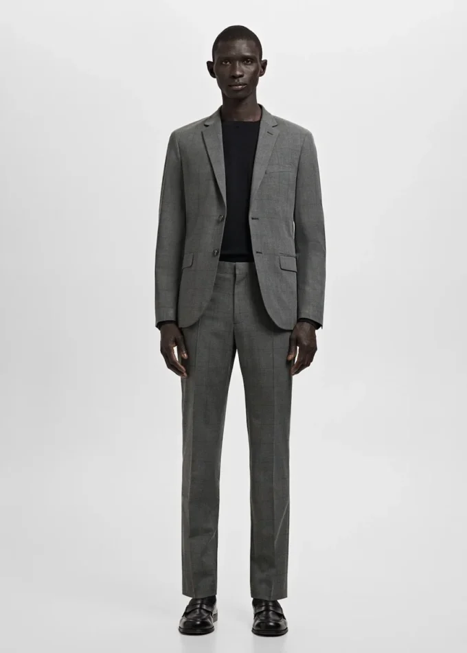 Spodnie garniturowe z elastycznego materiału o bardzo wąskim kroju Spodnie garniturowe z elastycznego materiału o bardzo wąskim kroju