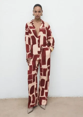 Spodnie o płynnym kroju z geometrycznym wzorem Spodnie o płynnym kroju z geometrycznym wzorem