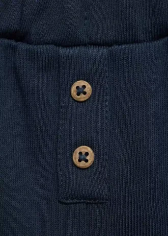 Spodnie z guzikami o prostym kroju