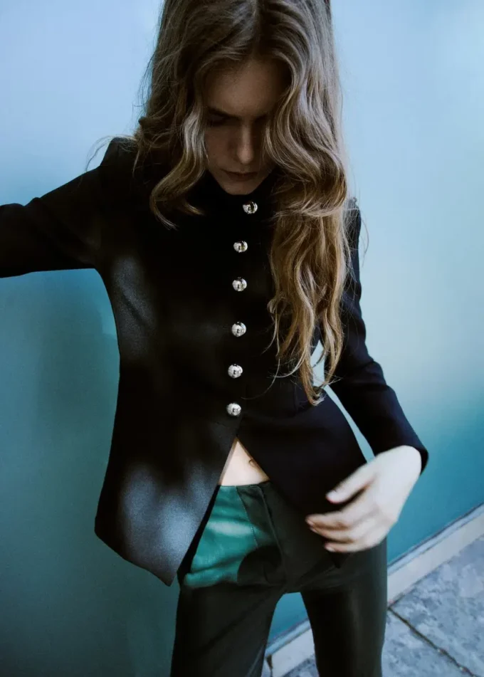 Spodnie z sztucznej skóry z rozkloszowanymi nogawkami Spodnie z sztucznej skóry z rozkloszowanymi nogawkami