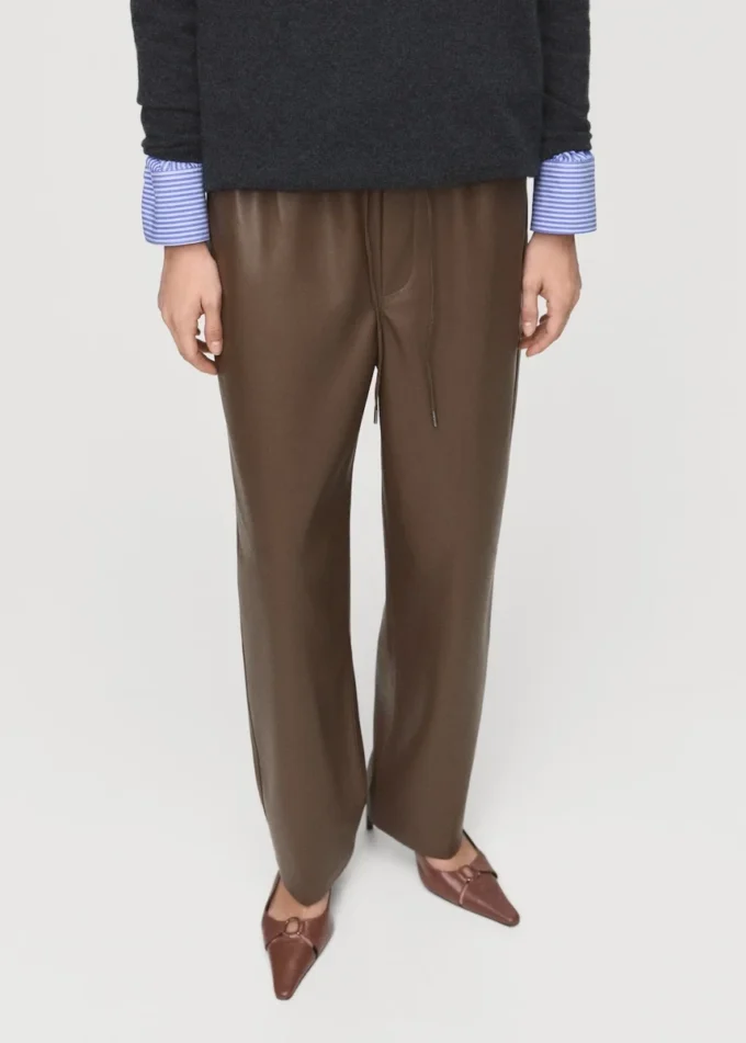 Spodnie ze sztucznej skóry z elastyczną talią Spodnie ze sztucznej skóry z elastyczną talią