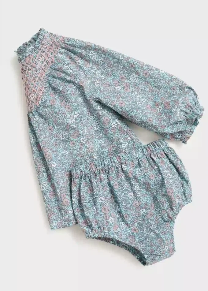 Sukienka z nadrukiem i osłonka na pieluchę Sukienka z nadrukiem i osłonka na pieluchę